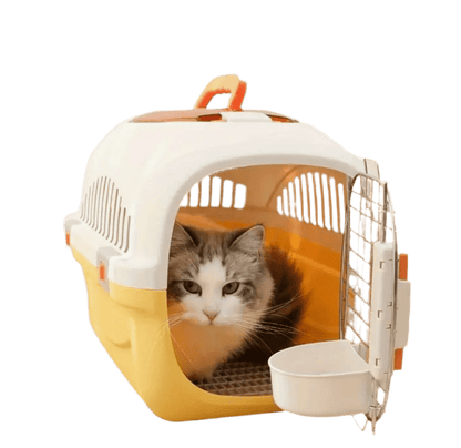 Yellow and white top-load ventilated cat carrier with metal front door and small bowl