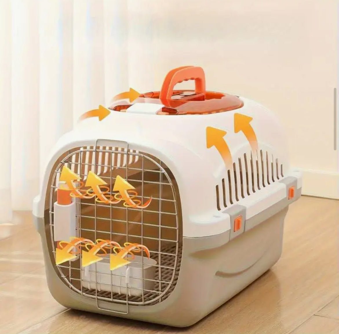 White top-load ventilated cat carrier with hinged metal front grille and orange handle