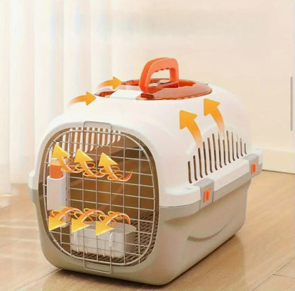 White top-load ventilated cat carrier with hinged metal front grille and orange handle