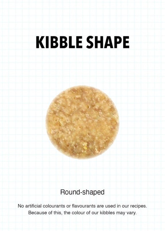 Round-shaped kitten kibble pieces, light brown, for dry food feeding.